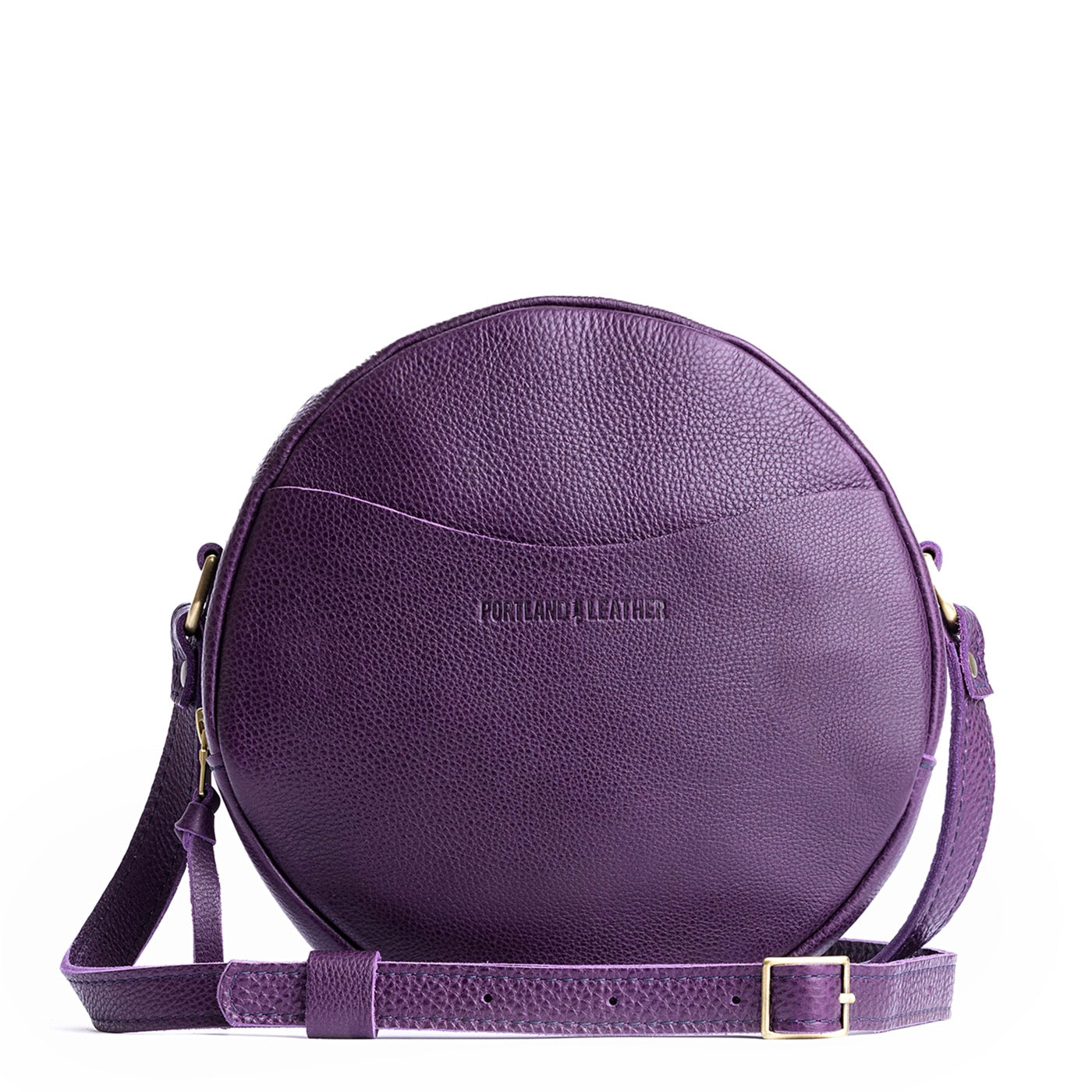 Empire*Large | Circle shaped crossbody with exterior pocket and top zipper