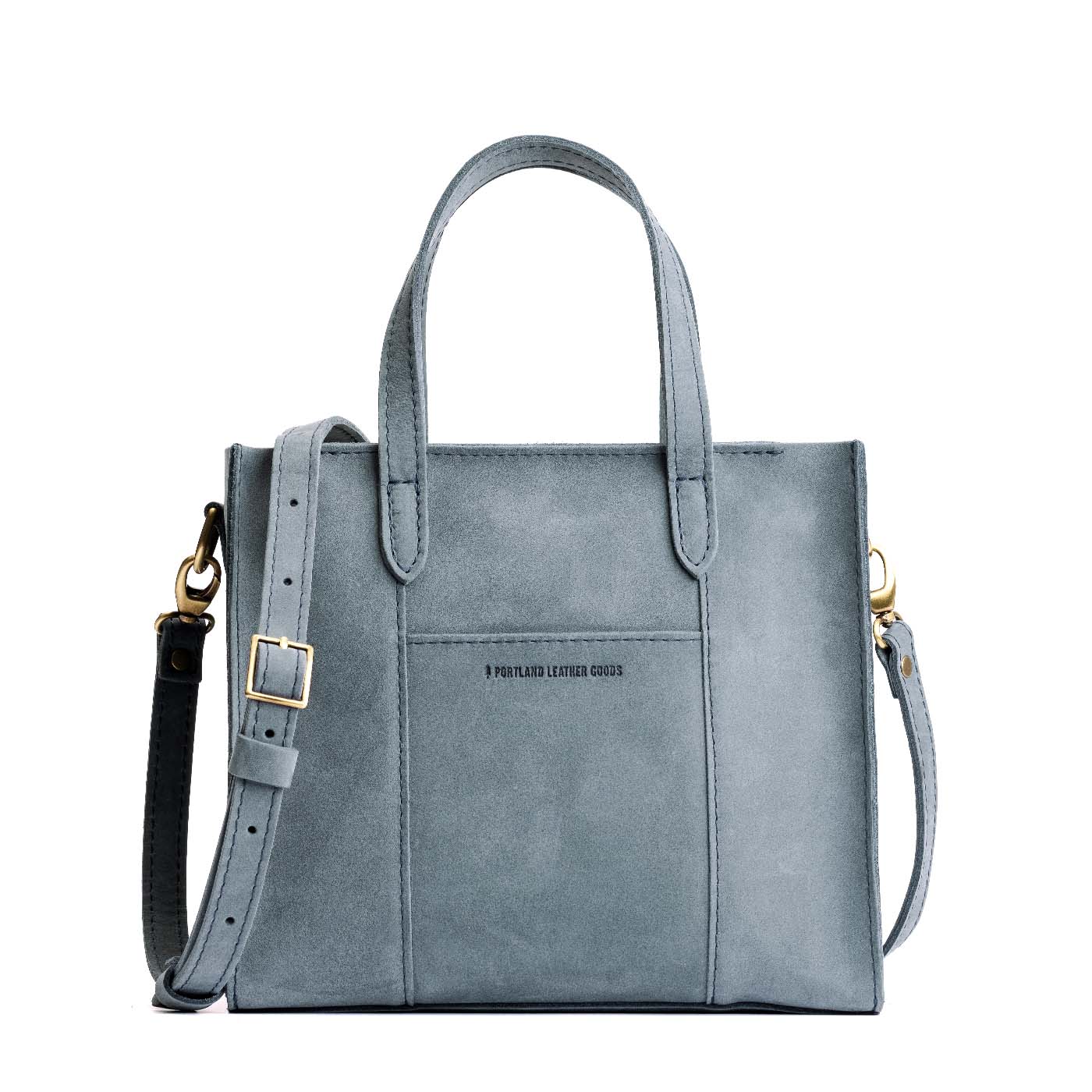 Storm*Zipper | Structured mid-size tote bag with overlapping panels and crossbody strap