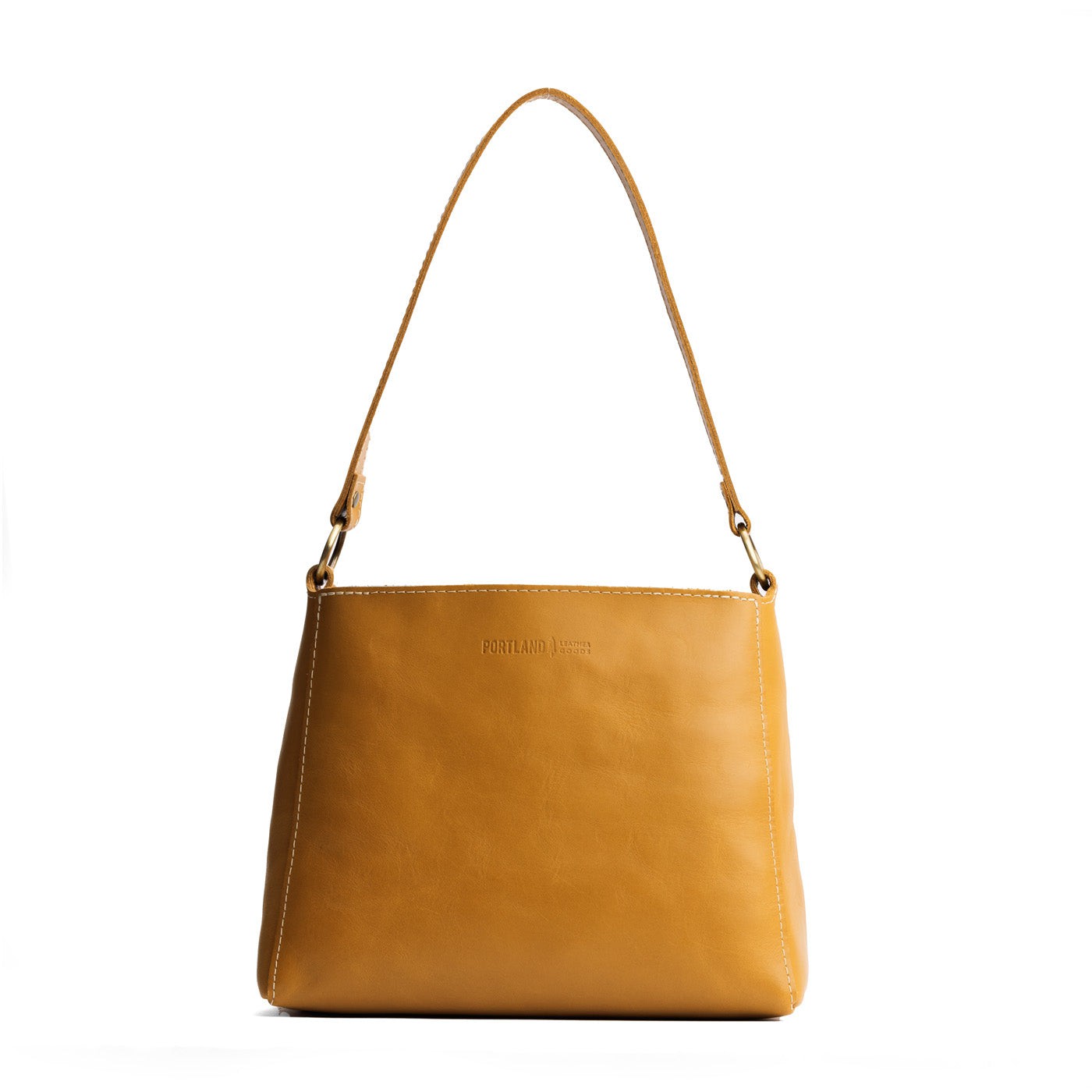 Mango | Triangular shoulder bag with antiqued brass finished hardware